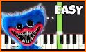 huggy wuggy piano playtime related image