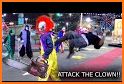 Clown vs Zombie related image